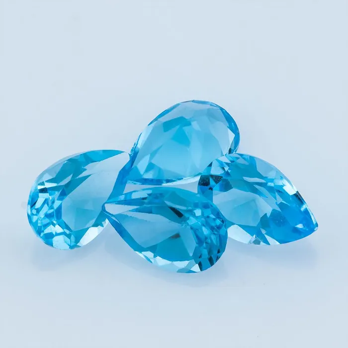 6x4MM Lot 52 PCS PEAR Swiss Blue Topaz 26 CT - Stock Unlimited