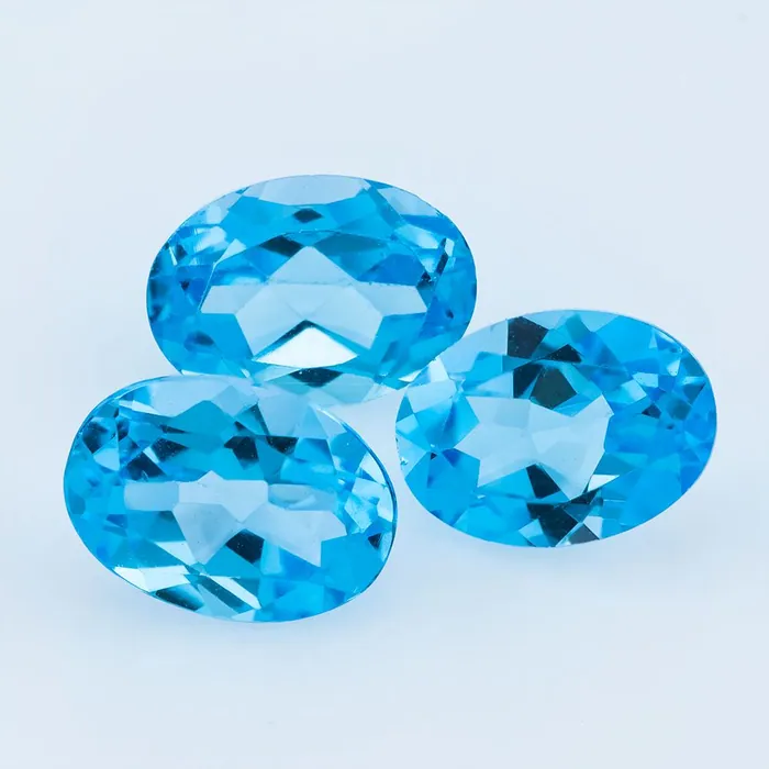 7X5 MM Lot 33 PCS Oval Swiss Blue Topaz 31.35 CT - Stock Unlimited