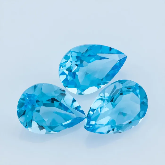 7X5MM Lot 32 PCS PEAR Swiss Blue Topaz 25.60 CT - Stock Unlimited
